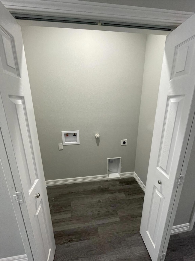 Laundry closet at entrance of hallway