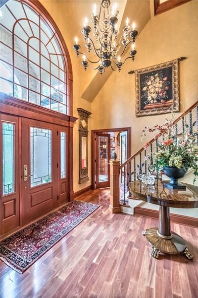 Grande 2 Story Hardwood Entry FoyerTurned Staircas