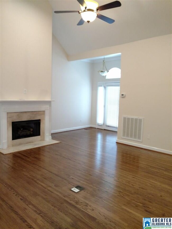 BEAUTIFUL HARDWOODS PLUS A FIREPLACE