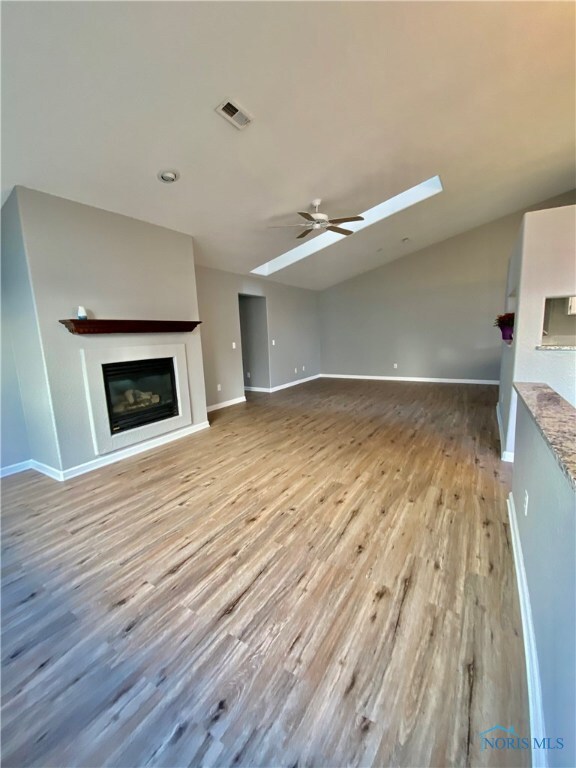 Living room with gas fireplace.