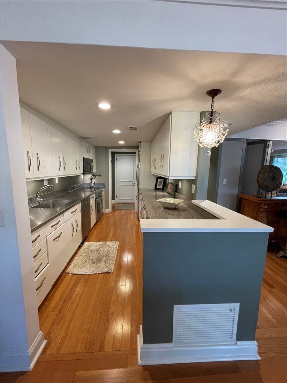 Wall modified to connect kitchen to living-dining