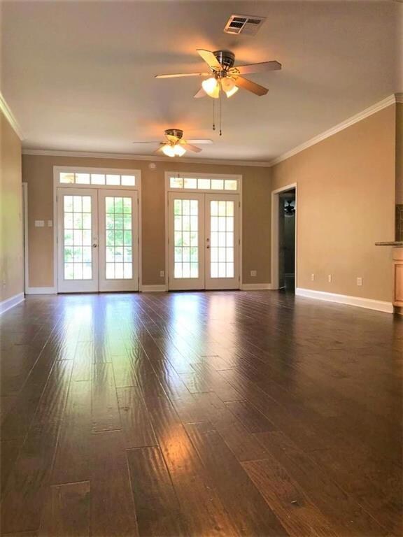 Living room with french doors leading to rear porc