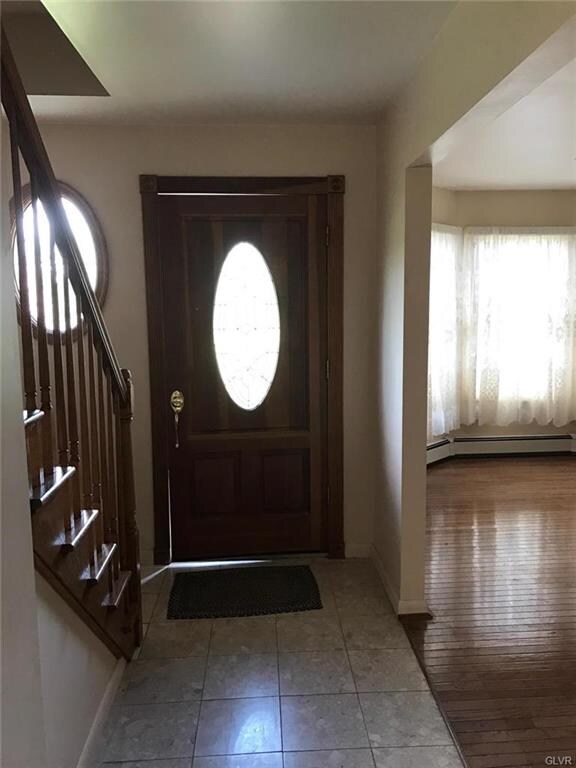 Front Foyer and Marble Tile Hall