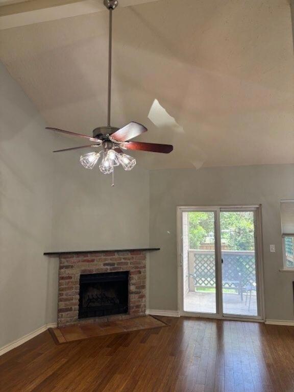 Unfurnished living room featuring hardwood / wood