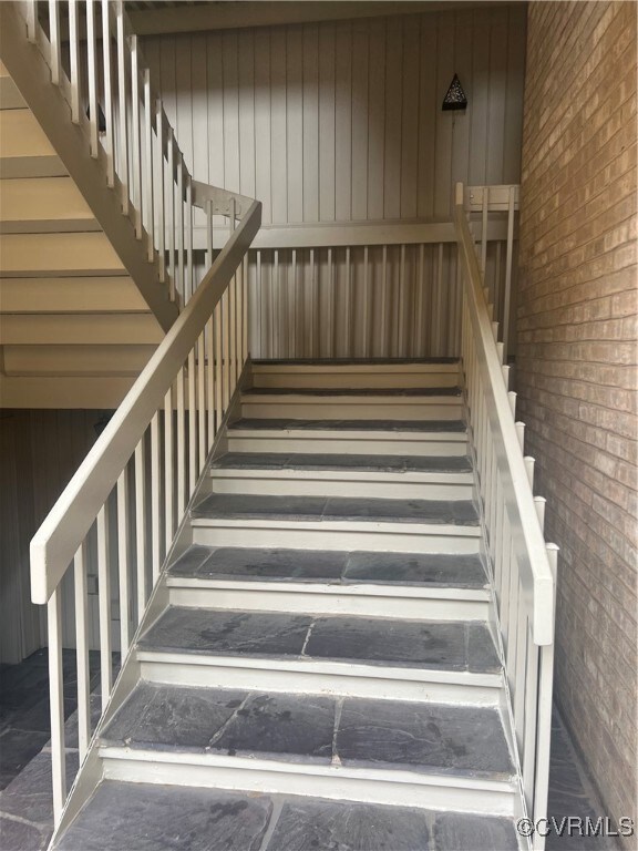 Stairway with brick wall