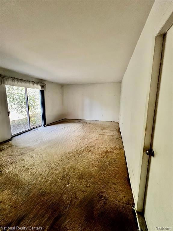 View of carpeted spare room