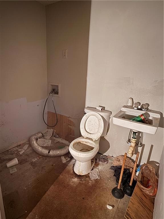 Bathroom with toilet and a sink