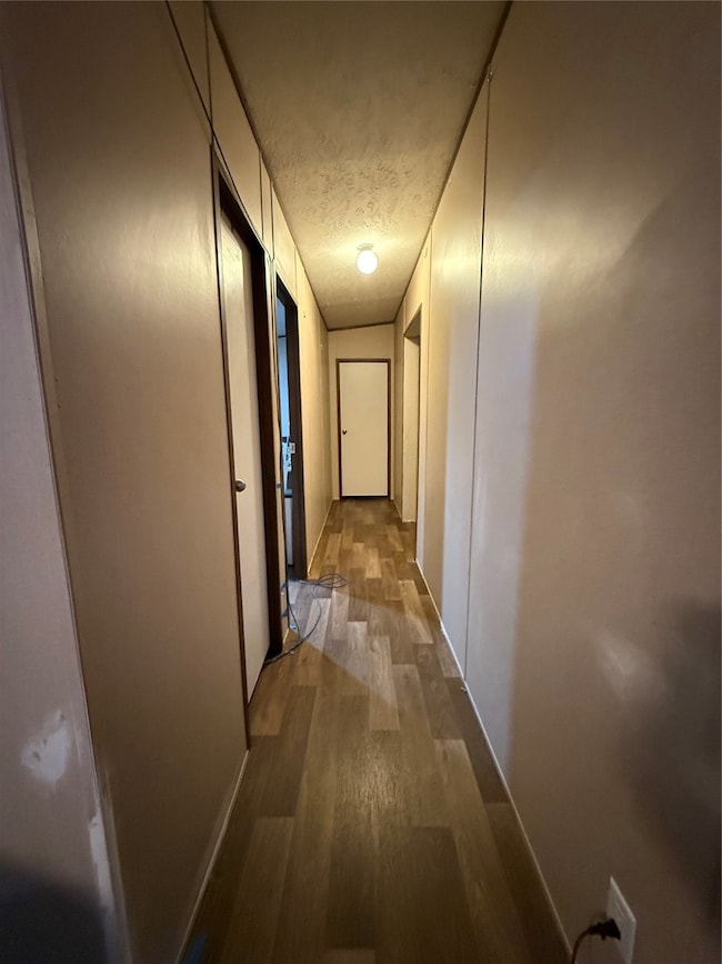 2nd bathroom to left and 2 bedrooms down the hall