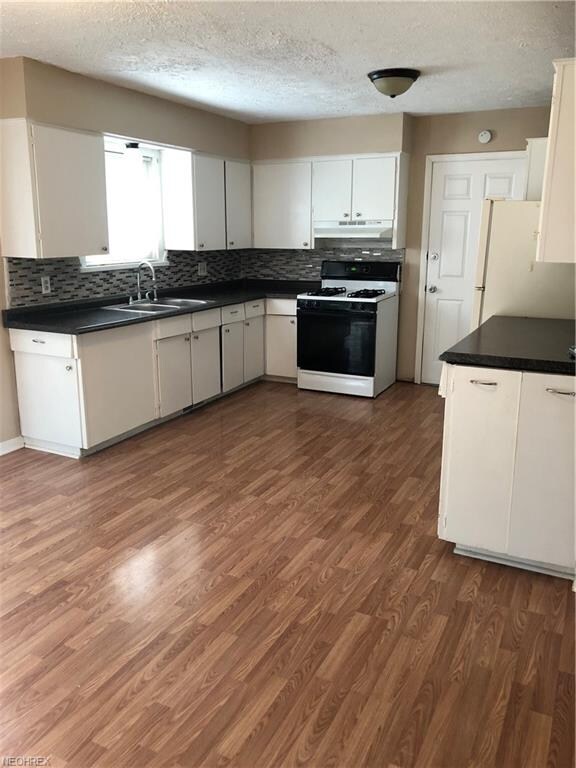 Kitchen with plenty of cupboards and counter space
