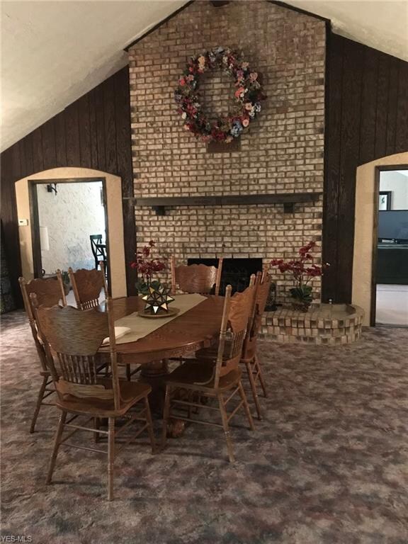 Family room or formal DR with full wall brick wood