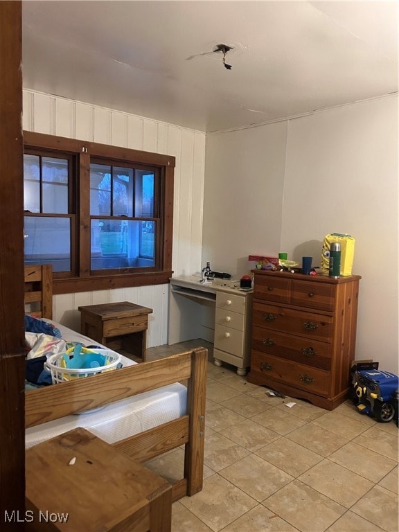 Bedroom featuring light tile patterned floors