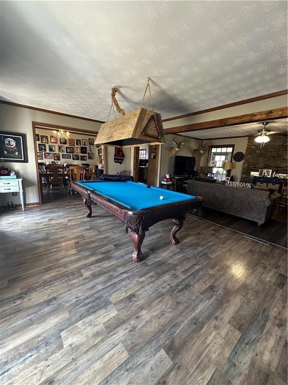 Playroom with ceiling fan, crown molding, hardwood