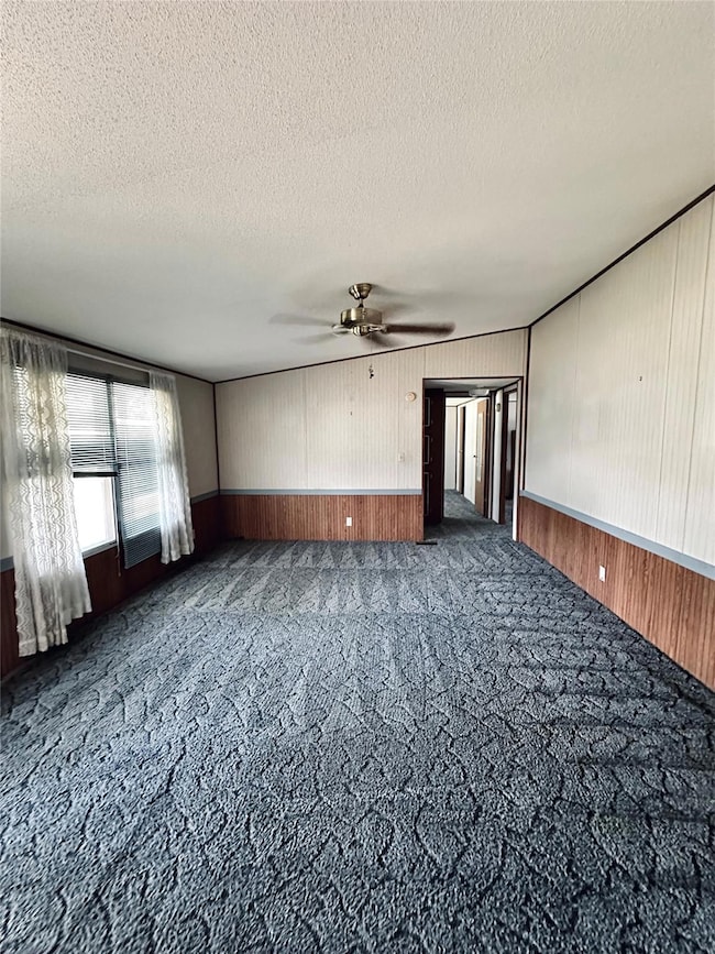 Large living area with big window.