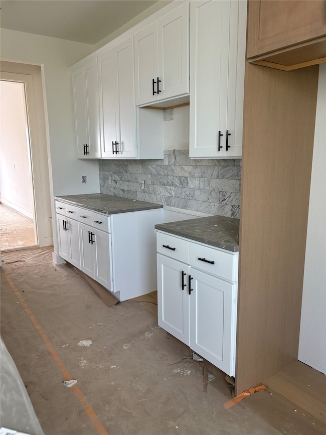 Kitchen with large island and granite