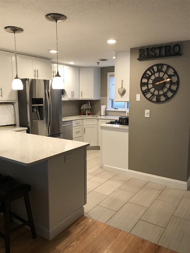 Beautiful granite counters and tile floors