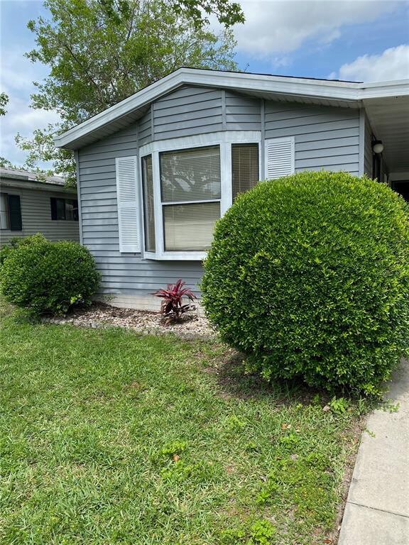 LOVELY BAY WINDOW WITH SHUTTERS