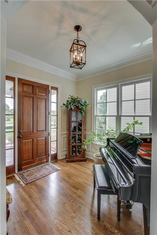 Entry with hardwood floor