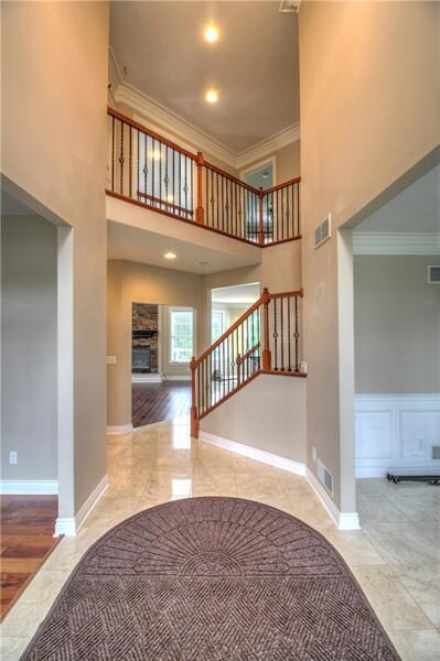 Simply elegant Two-Story Foyer offers a great view