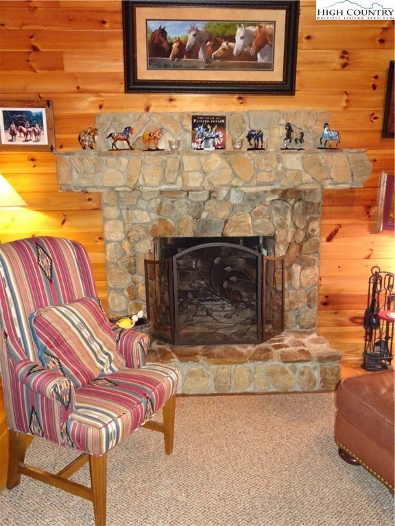 Painted Pony cozy stone fireplace.