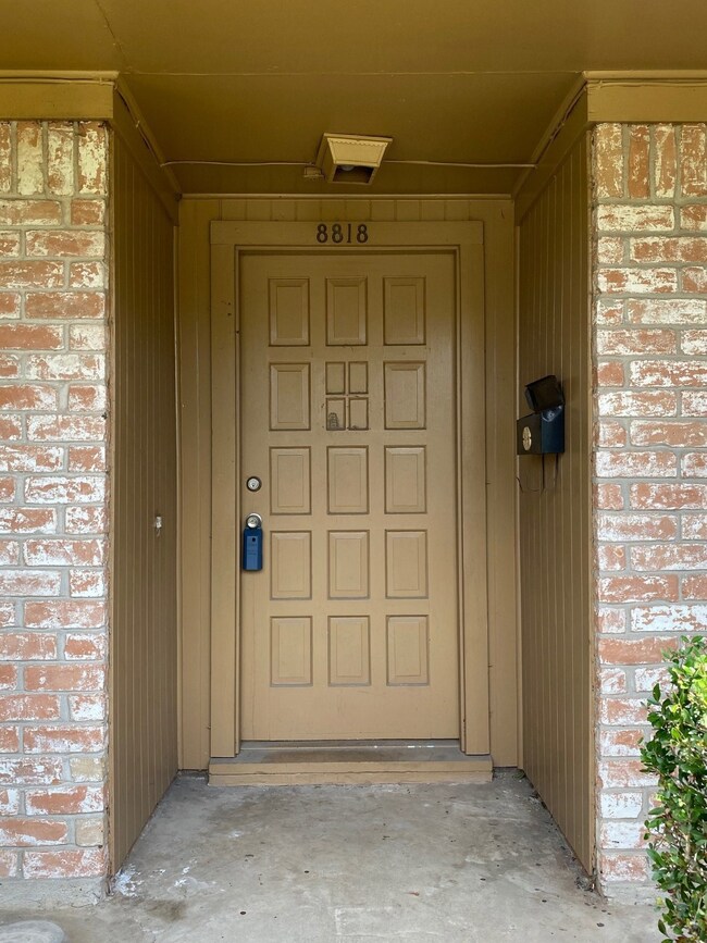 The elegant entryway door is recessed in between two walls for added your protection from the elements. Plenty of privacy.