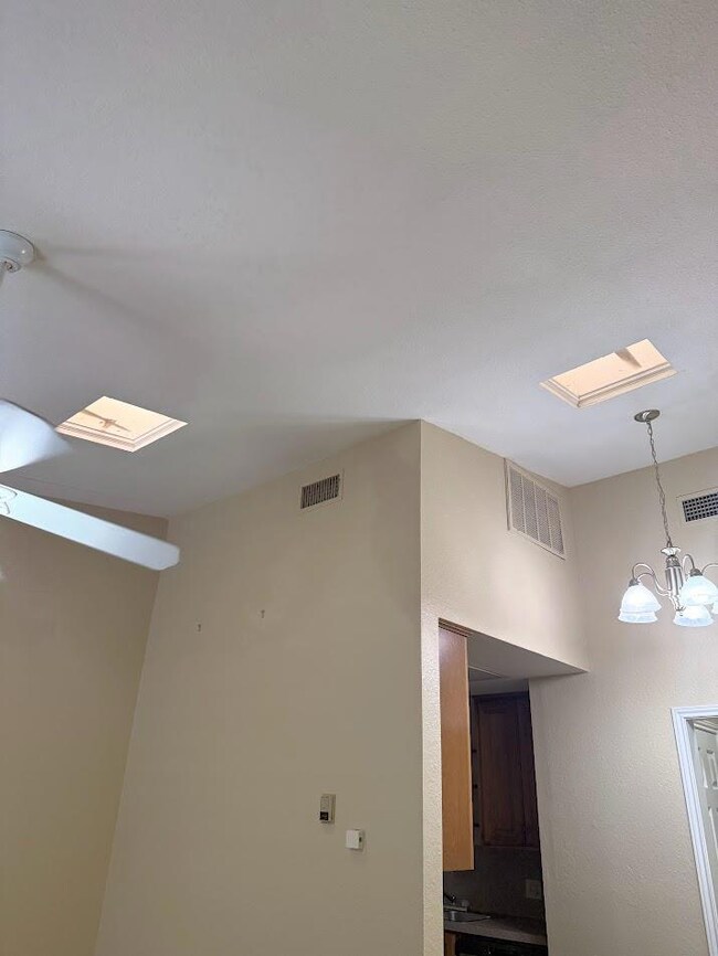 Detailed view of a chandelier and a skylight