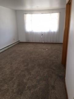 Living Room with fresh paint and new carpet!