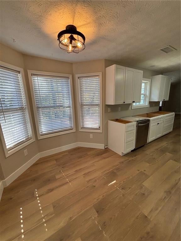 Bay window, new lighting and flooring