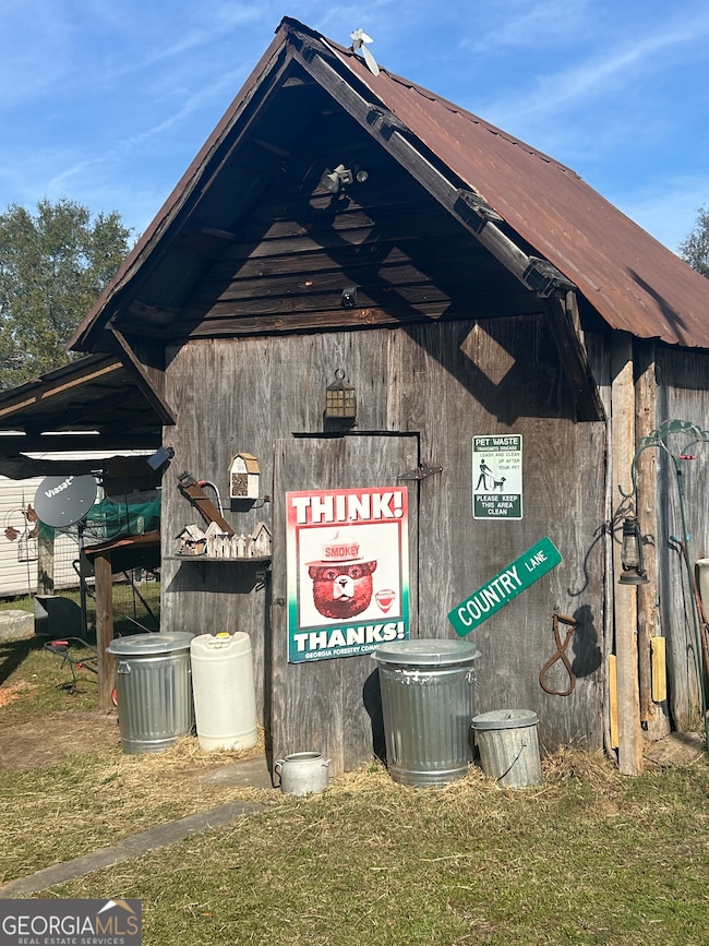 Smokehouse and/or additional storage.