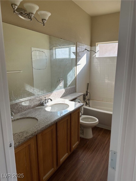 Bathroom featuring a wealth of natural light, a si