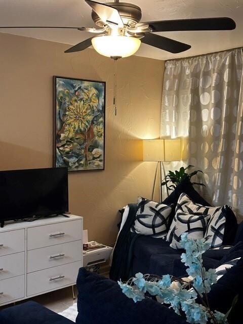 Bedroom featuring ceiling fan