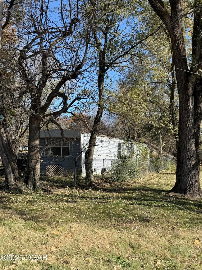 605 N Tennessee Ave, Carterville, MO 64835 - photo 4