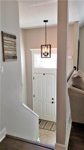 Grand entry with tile and updated light, seen thro
