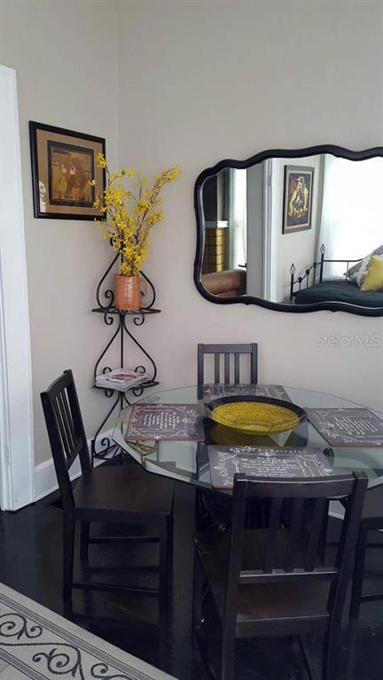 Table with four chairs in sunroom