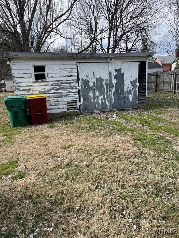 View of outdoor structure with an outbuilding and