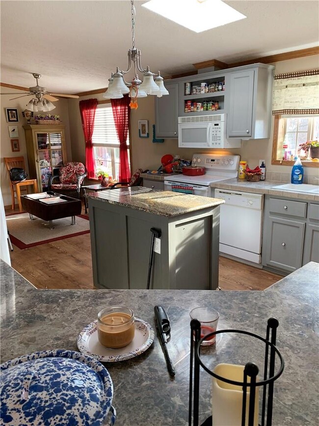 looking into the kitchen from the living room pass