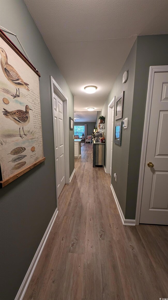 Hall featuring hardwood / wood-style floors