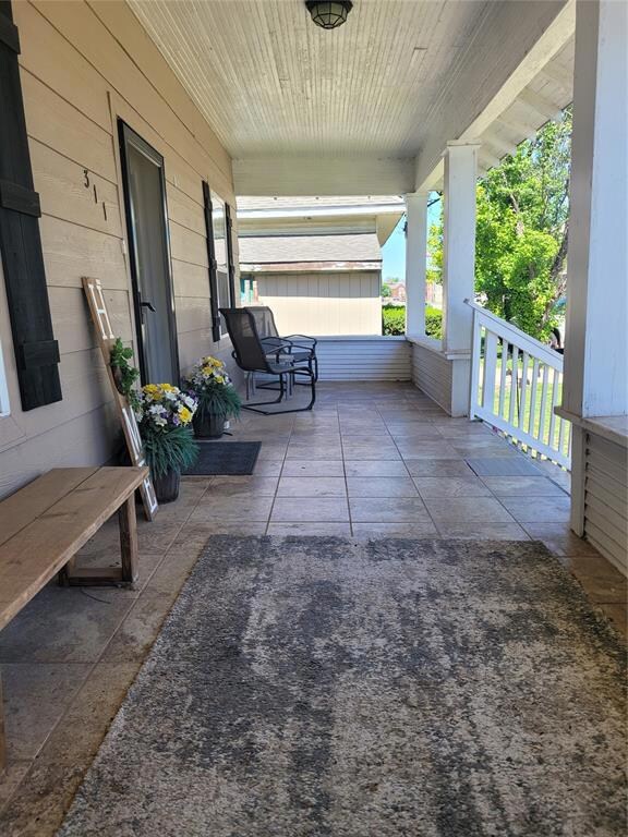 View of patio / terrace featuring covered porch