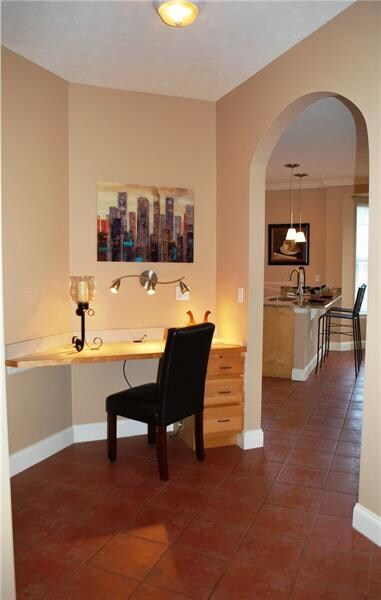 Built-in computer desk area with lighting
