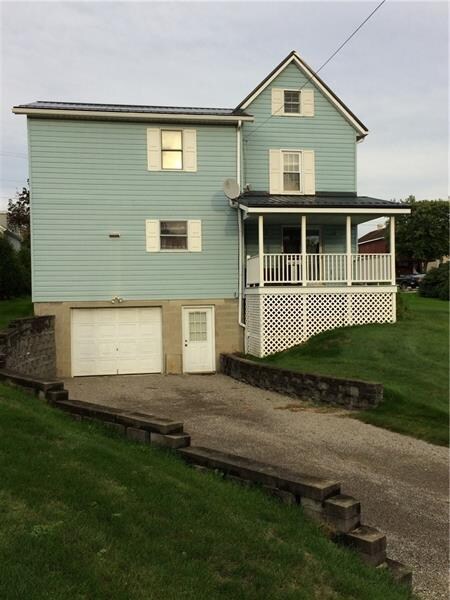 Back of home; large driveway
