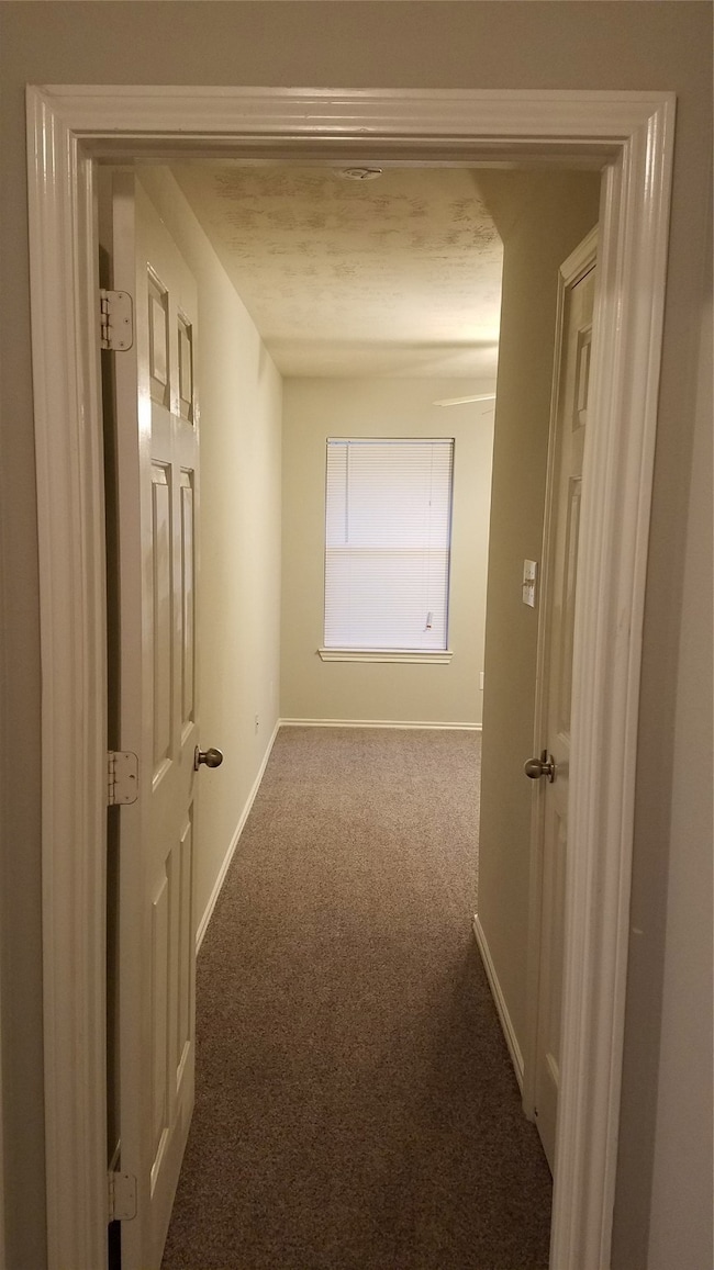 Hallway from family room to bedroom two