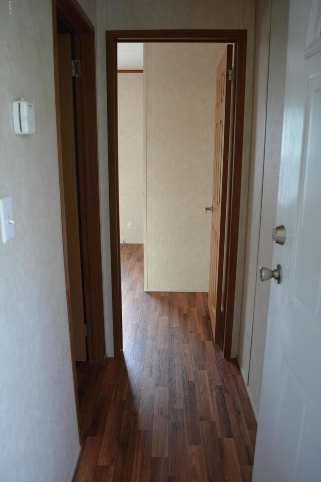 Hallway to back bedroom and bathroom