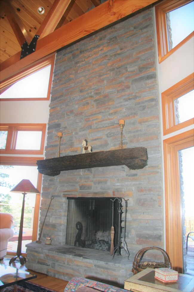 Floor to ceiling stone fireplace