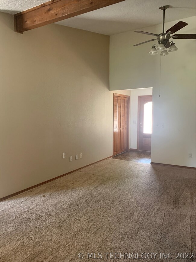 Welcoming entry with coat closet.  Vaulted ceiling