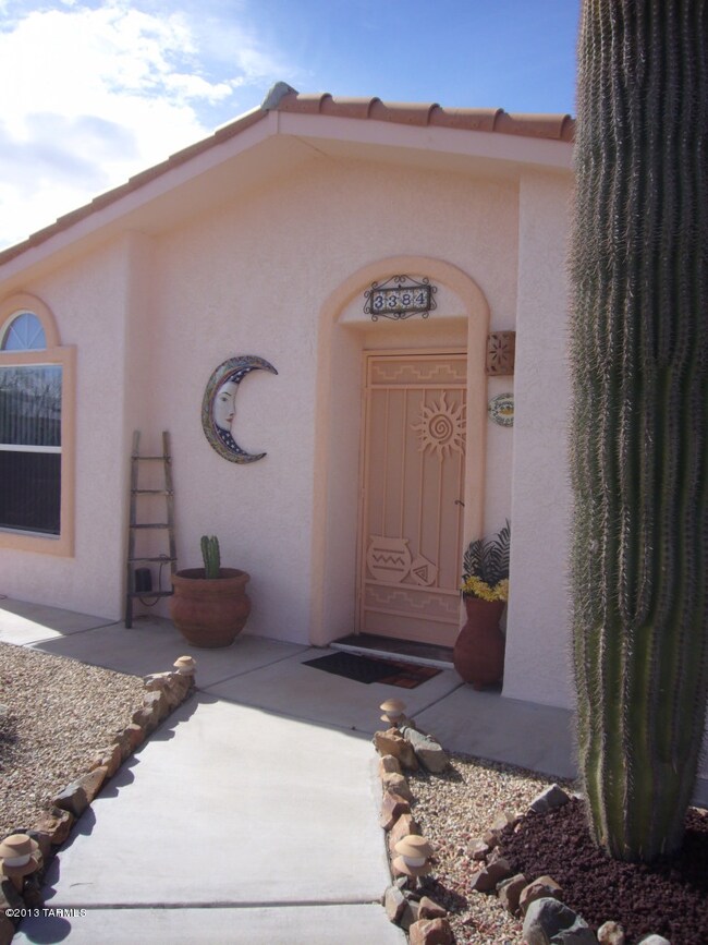 Front entry- beautiful wrought iron door