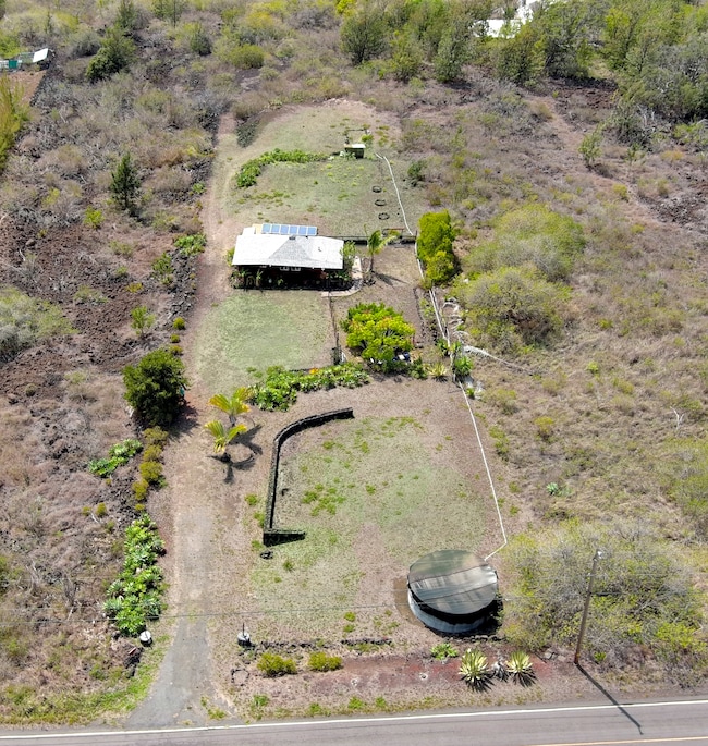 Well planned out Lot, the street frontage has a house pad, close to power and 16,000 gallon-water tank. Note waterline runs to the back of the lot.