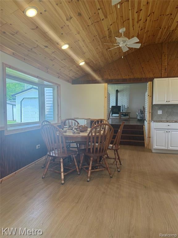 Bathroom featuring baseboards and light wood-style floors
