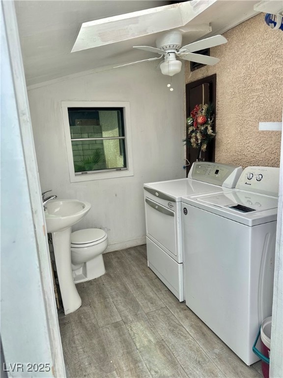 Laundry room featuring washing machine and dryer,