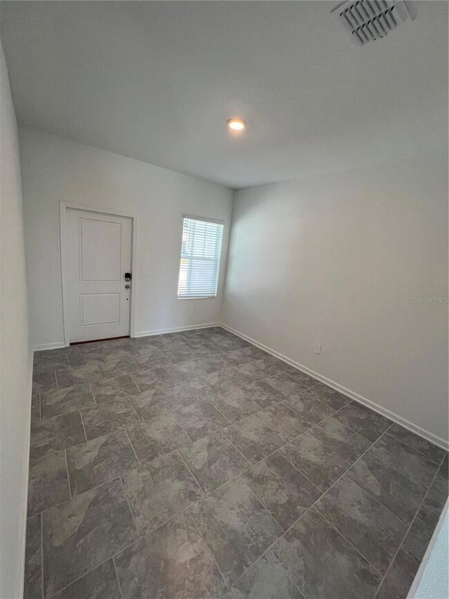 3299 Laurent Loop, Davenport, FL 33837 - photo 6