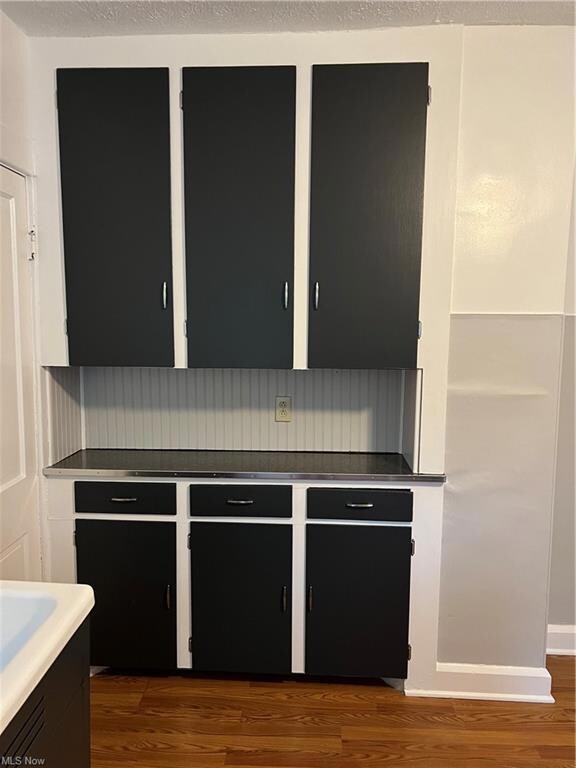Kitchen 14 x 11 with laminate flooring.