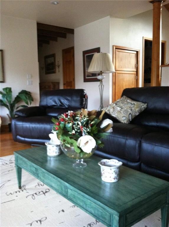 Living room view into foyer area